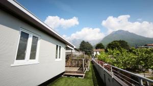 a view from the balcony of a house at Camping Continental in Mandello del Lario