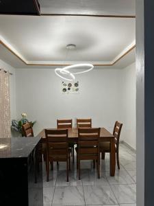 a dining room with a table and chairs at Casa Privé, Comayagua in Comayagua