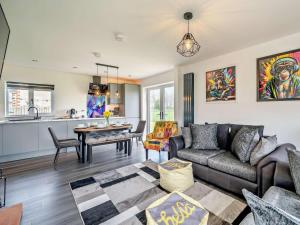 a living room with a couch and a table at 3 Bed in Carlisle oc-94673 in Longtown