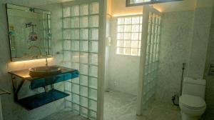 a bathroom with a sink and a toilet at Ayeda Villa 2 in Krabi +12 photos