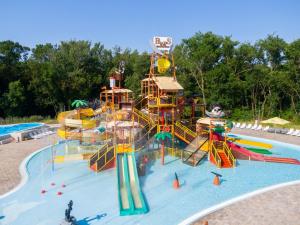 a large water park with a water slide at Aquasolis Spa Hotel in Poľný Kesov