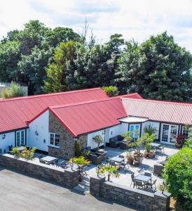 an aerial view of a building with red roofs at Little Green Glamping Pod in Narberth