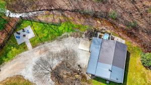 an overhead view of a building in the grass at Brookside Cabin in South Bloomingville
