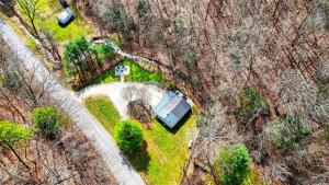 an aerial view of a house in the woods at Brookside Cabin in South Bloomingville