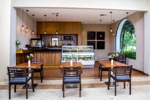 A cozinha ou cozinha compacta de Dreams Playa Bonita All Inclusive