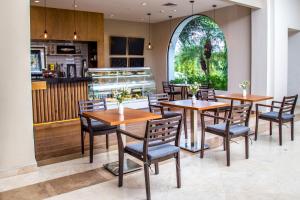 A cozinha ou cozinha compacta de Dreams Playa Bonita All Inclusive