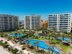 an aerial view of a resort with buildings at Apartment Grape Panorama Mar Punta Prima in Punta Prima