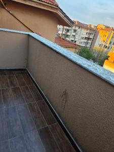 a spider on the side of a wall on a balcony at Boutique Apartment with Jacuzzi Pleven in Pleven