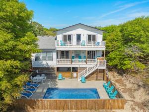 an aerial view of a house with a swimming pool at Wax Turtle in Southern Shores