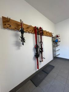 a group of skis hanging on a wall at Wiererhof in Fügenberg