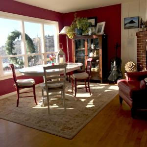 a living room with a dining room table and chairs at Trinidad Bay Bed and Breakfast Hotel in Trinidad