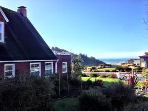 a house with a view of the ocean at Trinidad Bay Bed and Breakfast Hotel in Trinidad