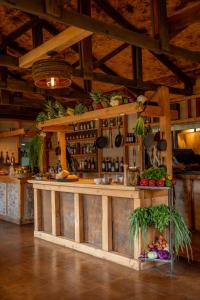 a kitchen with a counter with fruits and vegetables at Bonanza Glamp Nature Experience in El Chalten +77 photos