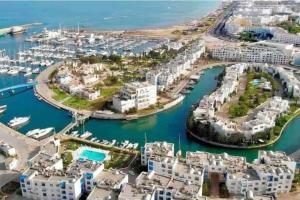 an aerial view of a marina with condos at Le Bleu Céleste in Hammamet