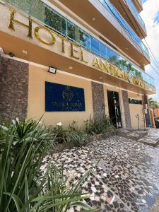 a building with a sign that reads hotel amazon at Hotel Antiga Roma in Belém