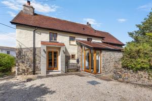 an old stone house with a roof at 3 Bed in Croyde oc-s27761 in Croyde