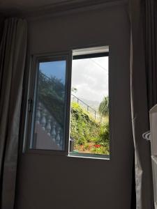 a window in a room with a view at Meu Quintal 4, Calheta-Madeira in Calheta