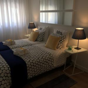 Ένα ή περισσότερα κρεβάτια σε δωμάτιο στο Apartamento Da Lapa