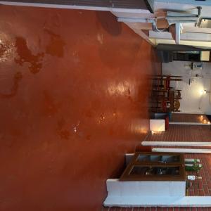a wall in a kitchen with orange paint at OceanBliss_Homestay04 in Villupuram