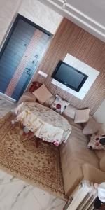 an overhead view of a bedroom with a bed at Amir's home in Meknès