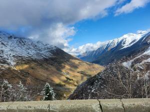 a view of a mountain with snow on it at Appartement station Piau-Engaly in Aragnouet
