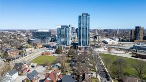 a view of a city with tall buildings at Open concept with city views in Kitchener