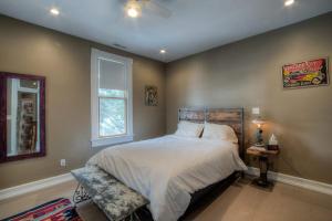 a bedroom with a bed and a window at Addie House in Lead