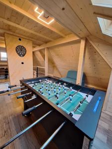 a room with a pool table in a house at Митровилица - Mitrovilica in Mitrovac