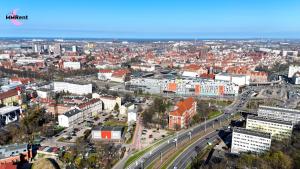 an aerial view of a city with a highway at MMRent Orange Room in Gdańsk