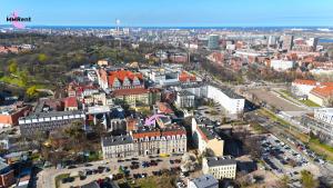 an aerial view of a city with buildings at MMRent Colorful Room in Gdańsk
