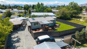 an aerial view of a house with a yard at Renovation, location, relaxation in Twizel