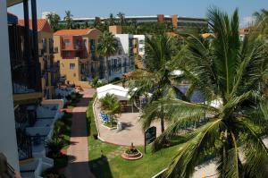 an aerial view of a resort with palm trees at El Cid Marina Beach Hotel in Mazatlán