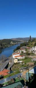 a view of a city with a river and buildings at Relaxing House in Lever