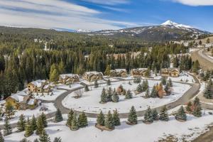 an aerial view of a resort in the snow at Creekside Chalet in Big Sky