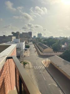 a view of a city street from a balcony at Deckon in Avéméné