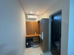 a small bathroom with a sink and a toilet at Pousada Complexo Vibe in Baraúna