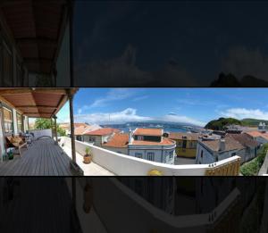 ein Blick auf eine Stadt vom Dach eines Hauses in der Unterkunft Casa do Porto da Horta in Horta