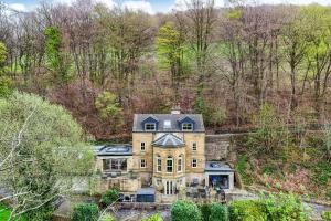 an aerial view of a house in the woods at Belvedere Farm in Halifax