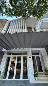 awning over the entrance to a building at The LH Homestay in Phú Quốc