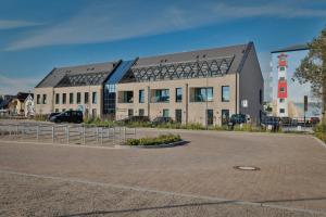 a large building with a lot of windows at Bett&Bude Boardinghouse in Westerland