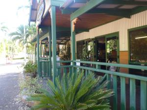 a store front with a plant in front of it at Ivanhoe Resort in Kununurra