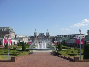 a fountain in a park in front of a building at Kobe Hotel Fruit Flower in Kobe +102 photos