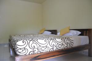 Postel nebo postele na pokoji v ubytování BB Homestay Two