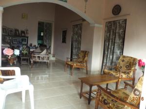 Posezení v ubytování Raja174 Homestay