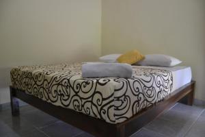 Postel nebo postele na pokoji v ubytování BB Homestay Two
