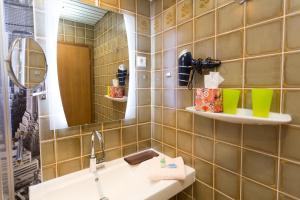 Ванна кімната в Aparthotel Zum Dom