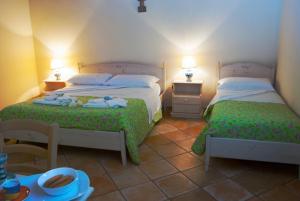 A bed or beds in a room at Agriturismo Al Casale