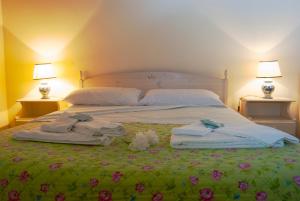 A bed or beds in a room at Agriturismo Al Casale