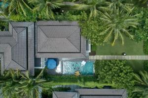 an overhead view of a house with a swimming pool at Luxury Private Pool Villas at Village Danang Resort in Danang