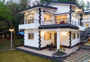 a rendering of a house in a suburb at Esperanza Villas by SVAR Stays in Panchgani